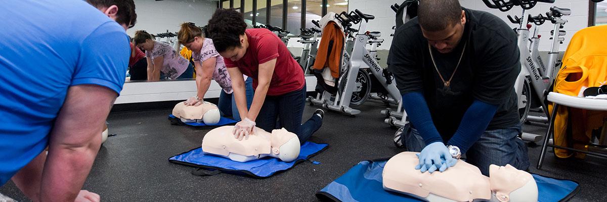 People participating in a Yates CPR certification class in Studio B.