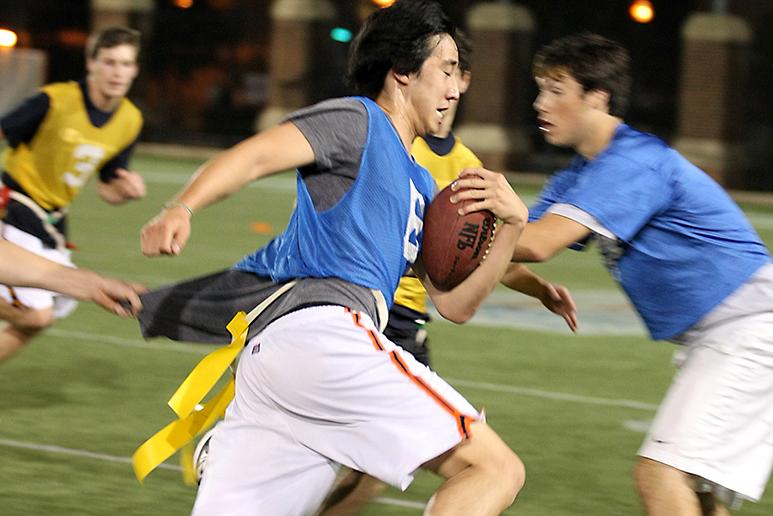 Participants playing flag football