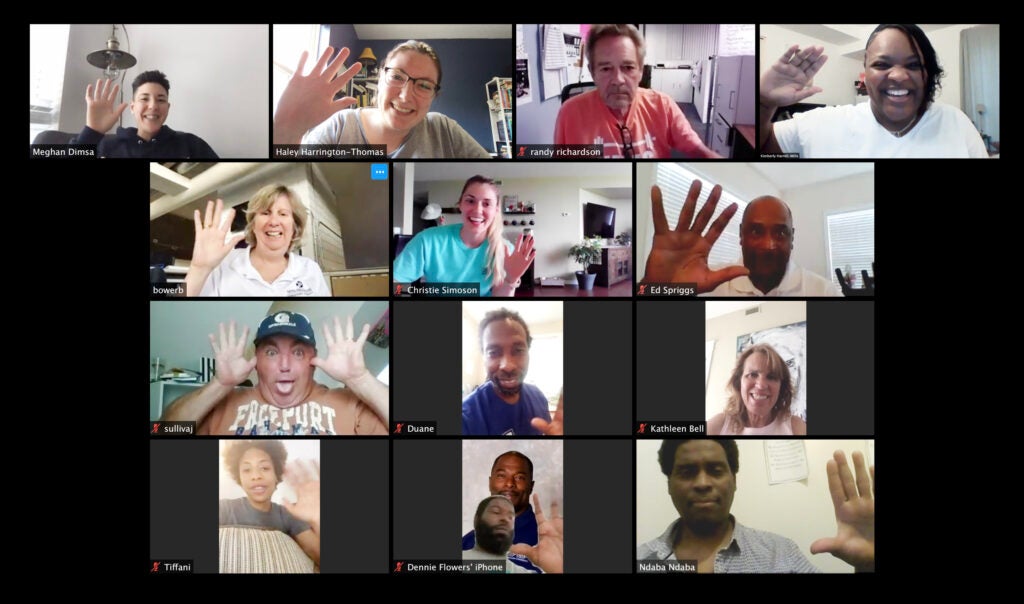 Yates Field House professional staff waving hello over a Zoom call.